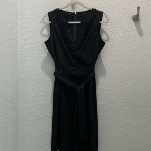 Blank sleeveless dress with tie belt.  Great summer dress